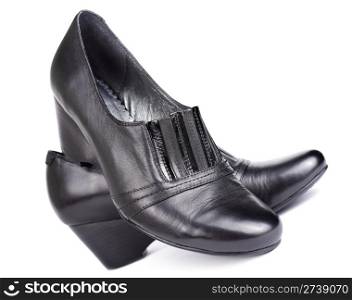a pair of momens black leather wedge heeled shoes