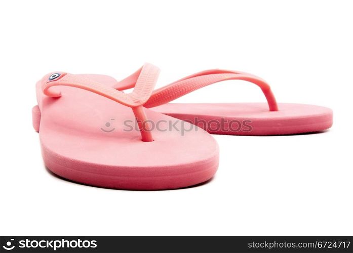 A pair of pink sandals on white background