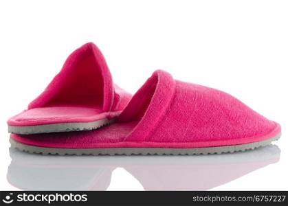 A pair of pink slippers on a white background.