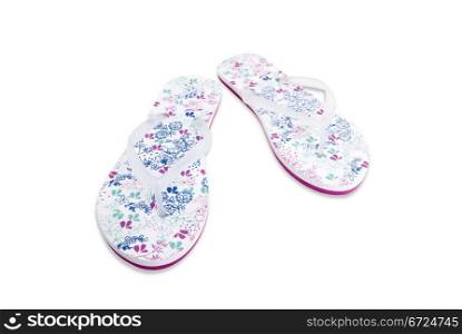 A pair of white sandals on white background