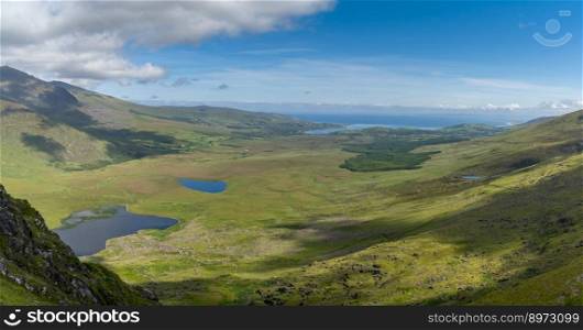 A panorama aerial view of the Mountains of the Central Dingle Peninsula in County Kerry of Ireland