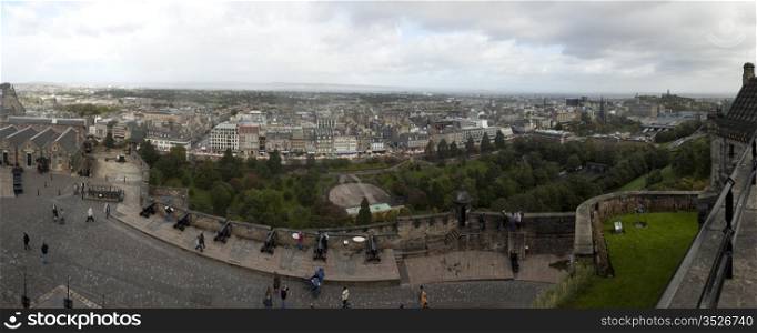 A panorama view of the center of the city of Edinburgh from the walls of Edinburgh Castle at the high point of the city.