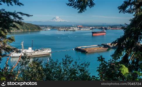 A panoramic shot of the Port of Tacoma with majestic Mount Rainier in the distance.
