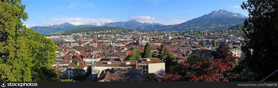 A panoramic view of Lucerne, Switzerland with Mount Pilatus looming on the left.. Lucerne Panorama