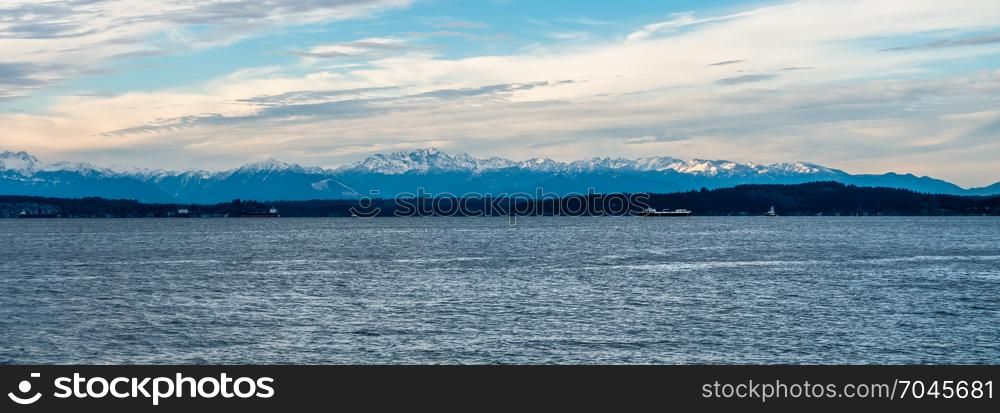 A panorma shot of the snowcapped peaks of the Olympic Mountains in Washington State.