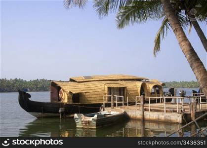 A parked houseboat on the backwaters of Kerala, India