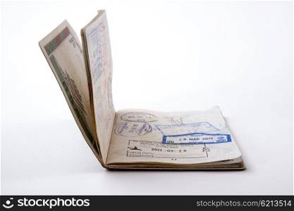 A Passport with stamps and dates on a white background.