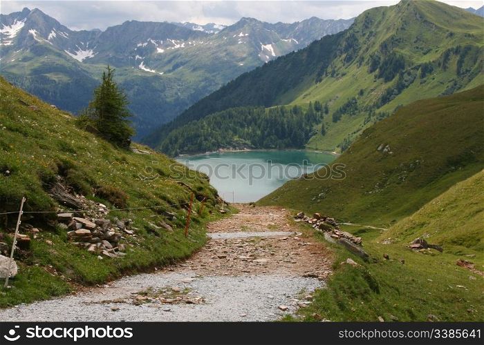 A path leading to Lago Ritom in the Swiss alps