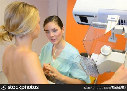 a patient undergoing mammography test