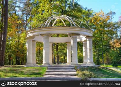 A pavilion or gazebo in a beautiful public garden park.