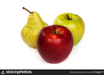 A pear and a red apple and a green apple isolated on a white background
