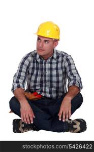 A pensive construction worker.