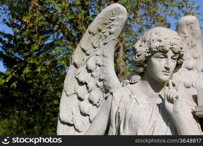 A pensive stone angel at Forest Lawn Cemetery, Buffalo, New York, USA