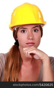 A pensive tradeswoman