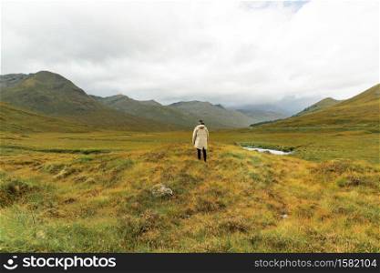 A person walking the nature of the Highlands