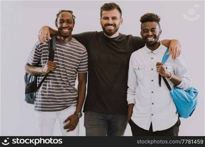 A photo of a group of happy students isolated on white background. High-quality photo. A photo of a group of happy students isolated on white background.