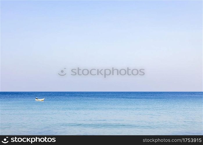 A photo of a morning sea landscape where the sea is reflected in the light and the blue water is refreshing. At Bang Tao Beach, Phuket Province, Thailand. Concept about travel, nature. No people.
