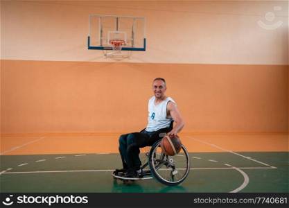 a photo of a war veteran playing basketball in a modern sports arena. The concept of sport for people with disabilities. High quality photo. a photo of a war veteran playing basketball in a modern sports arena. The concept of sport for people with disabilities