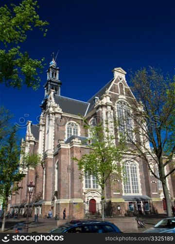a photo of famous westerkerk in amsterdam