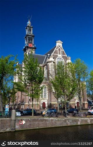 a photo of famous westerkerk in amsterdam