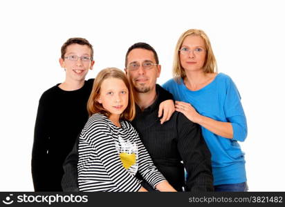 A picture of a young family with a daughter and son standing isolatedfor white background.