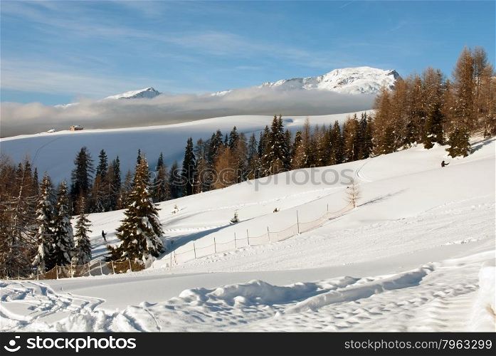 A picturesque winter scene in the Dolomites region of Northern Italy