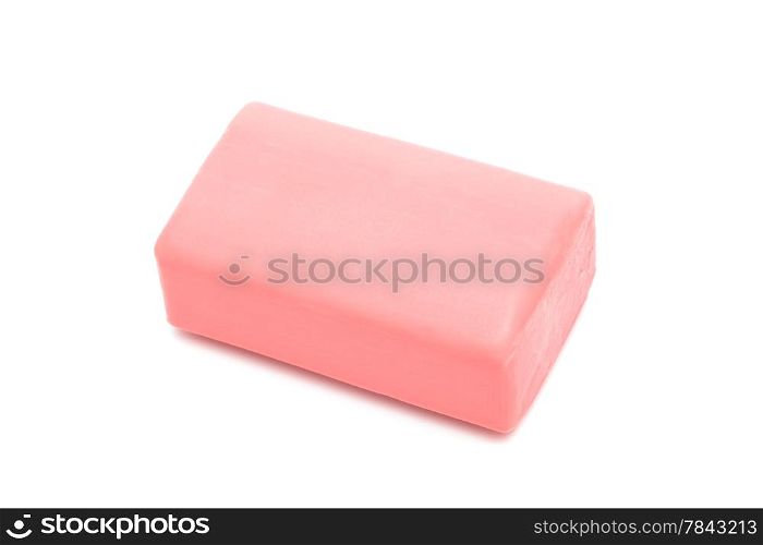 a piece of pink soap on a white background