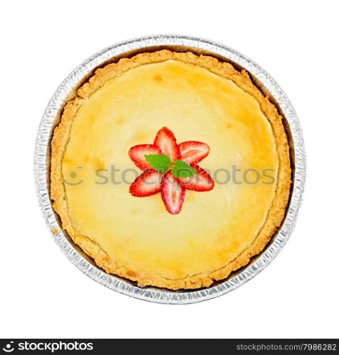 A piece of strawberry pie with cream sauce, strawberry, mint in a foil pan isolated on white background