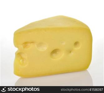 a piece of Swiss Cheese on a white background