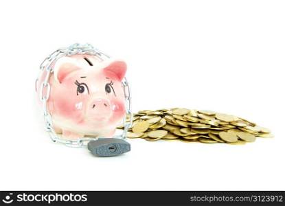 A piggy bank with a chain and padlock