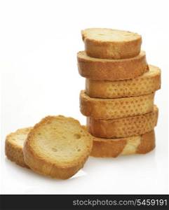 A Pile Of Bread Rusks On White Background
