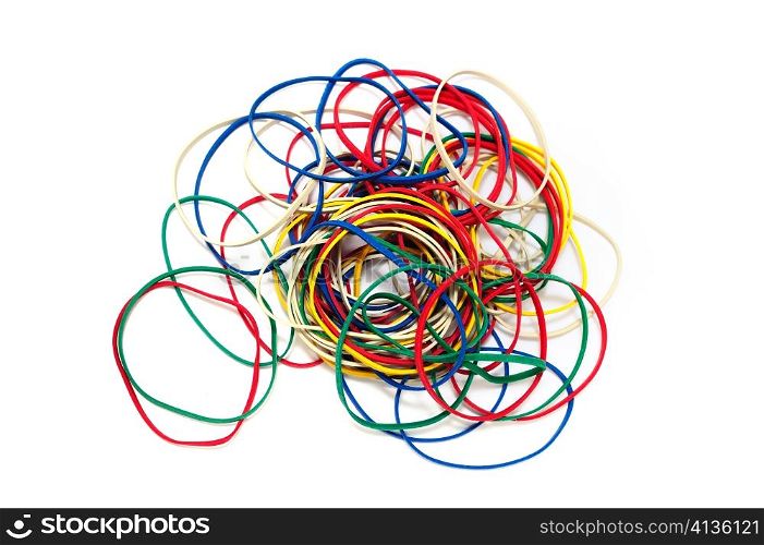 A pile of color rubber bands on a white background.