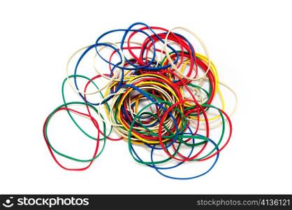 A pile of color rubber bands on a white background.