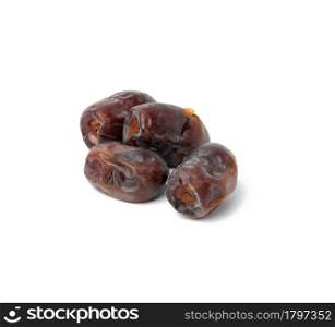 A pile of dried dates on a white background, grade Mazafati, close up