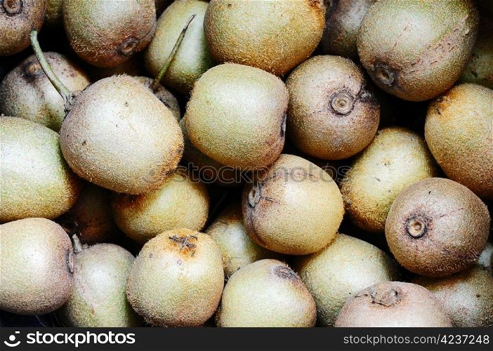 A pile of fresh wild kiwi fruits