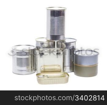 A pile of tinned foods with no labels. Shot on white background.