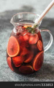 A pitcher of Spanish fruit Sangria