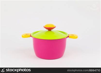 a plastic pot children’s toy on a white background. plastic pot children’s toy on a white background