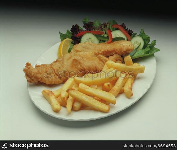 a plate of fish and chips/fries