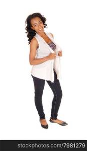 A portrait image of a african american women in a white blouse andblue jeans standing, isolated for white background.