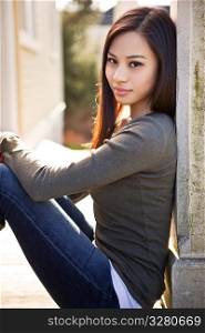 A portrait of a beautiful asian girl outdoor