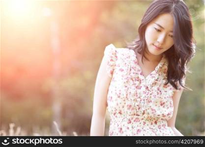 A portrait of a beautiful asian woman outdoor