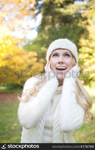 A portrait of a beautiful autumn woman outdoor