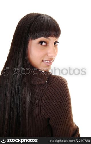 A portrait of a beautiful woman, looking back over her shoulder withlong black hair and nice dark eyes, on white background.