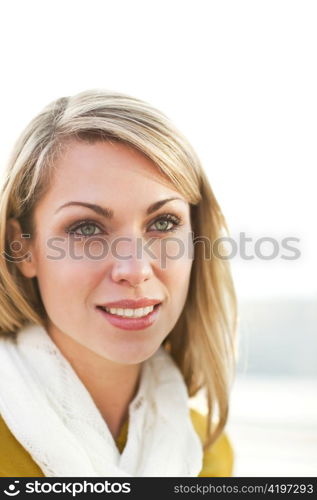 A portrait of a beautiful young caucasian woman smiling