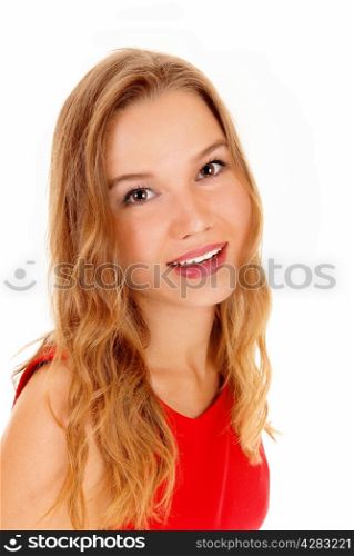 A portrait of a beautiful young woman standing in a red dress, looking intothe camera, isolated for white background.