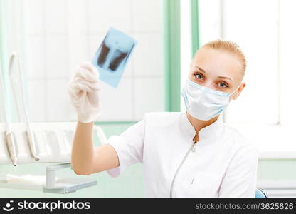 A portrait of a dental worker, dentist or assistant