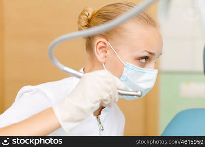 A portrait of a dental worker, dentist or assistant