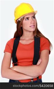 A portrait of a female construction worker.