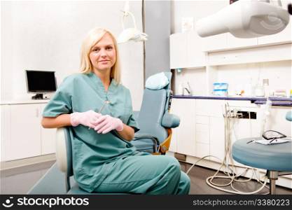 A portrait of a female dentist in a clinic